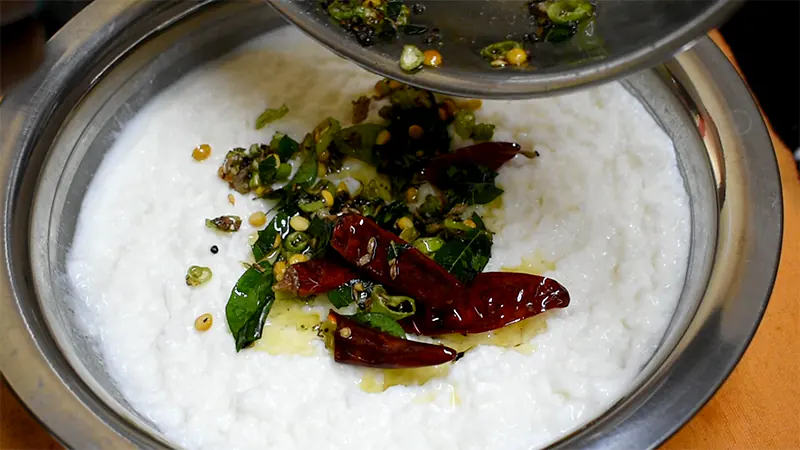 Authentic South Indian Curd Rice Recipe (Temple-Style Daddojanam) Add temper over curd rice, mix and serve fresh.