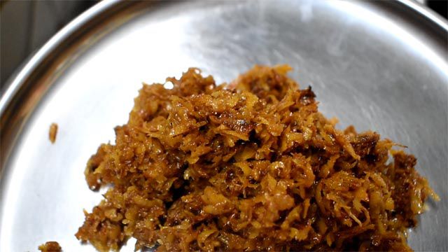 Spread coconut mix in a plate to cool.