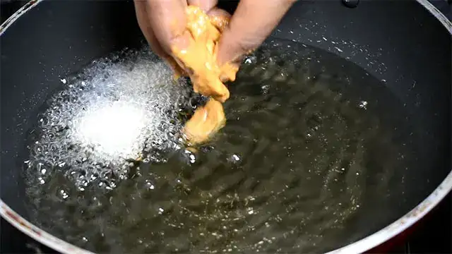 Healthy Mushroom Pakora Recipe mushroom pakora recipe: Place each coated mushroom in oil.